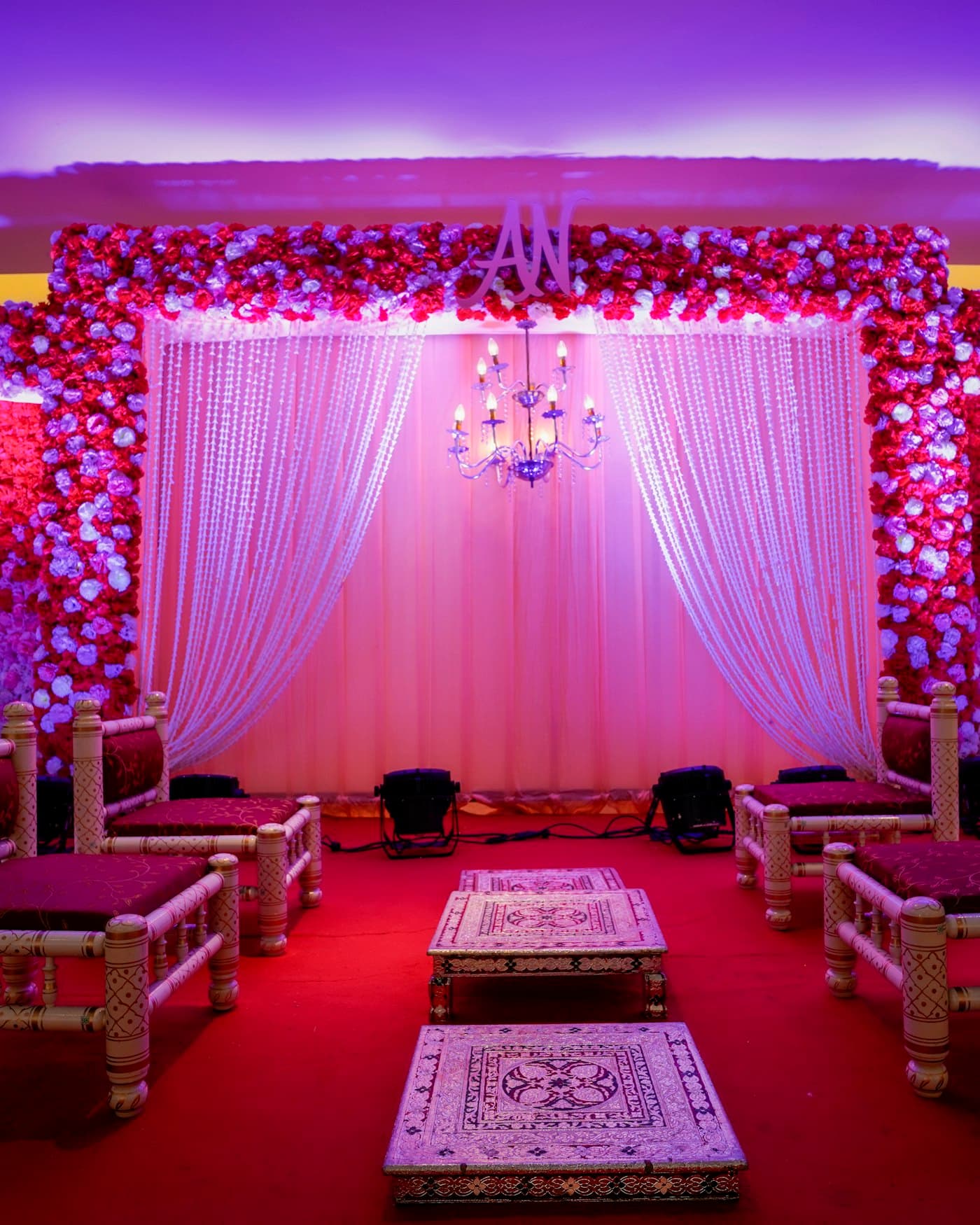 Chairs being set in rows before a ceremony